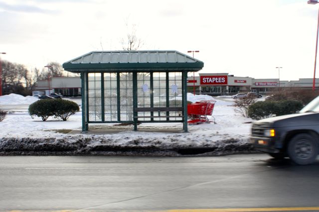 Bus shelter on CR 58 just west of the traffic circle. (RiverheadLOCAL photo by Peter Blasl)