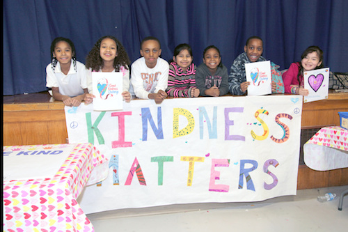 Students pose with their "Kindess Matters" banner. Photo provided by Sandra Kolbo.