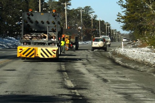 Road crews repair potholes on State Route 24 last month. (RiverheadLOCAL photo by Peter Blasl)