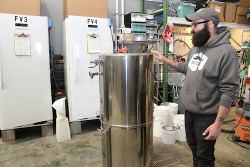 Matt Spitz talks about the brewery's fermenter. 