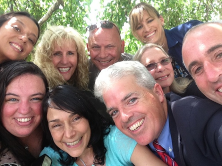 Bellone and others take a "selfie" in celebration. 