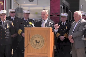 County Executive Steve Bellone announcing plans to upgrade the county's communication systems April 17 at Patchogue Fire Department headquarters. (Photo: Steve Bellone YouTube video)