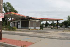 Abandoned gas station on the traffic circle in Riverside, opposite and abandoned diner.