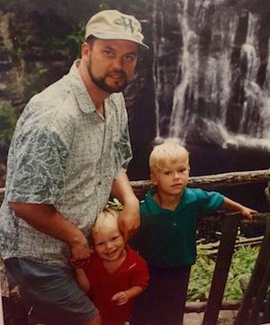 Richard Hejmej with his sons, Michael, right, and Matthew.