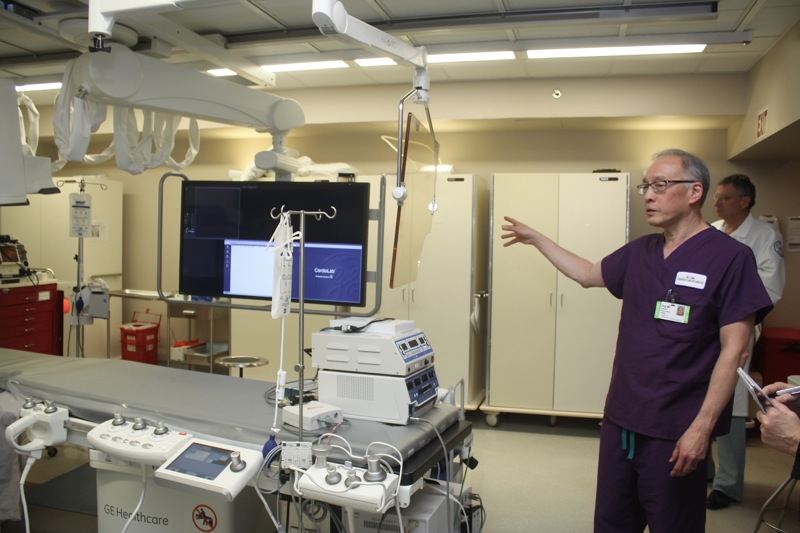 Dr. Larry Ong, North Shore-LIJ’s head of cardiac catheterization talks about Southside Hospital's electrophysiology equipment. Photo: Peter Blasl