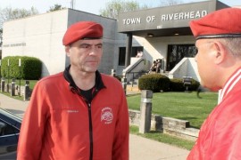 Guardian Angels founder Curtis Sliwa, left, and the organization's East End coordinator, Benjamin Garcia, traveled to Riverhead from NYC May 5 to meet with Riverhead Police brass and take a tour of downtown with cops. Photo: Denise Civiletti
