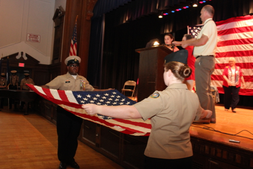 NJROTC cadets demonstrate a formal flag folding ceremony. Photo: Katie Blasl