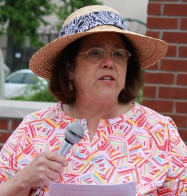 Angela DeVito, who organized the candlelight vigil, exhorted those in attendance to work to ensure the promise and hope of the Civil Rights movement are not lost. Photo: Denise Civiletti