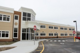 Riverhead Charter School's new facility, which began operating in January 2015, is set back further from the road than the old building. File photo: Katie Blasl
