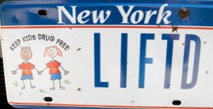 Gomez's vanity plate bears the street slang for "getting high" alongside a "Keep Kids Drug Free" picture. Photo: Suffolk County District Attorney's Office
