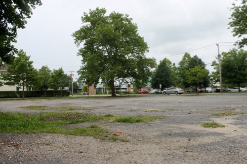 The town purchased this half-acre lot from Suffolk County National Bank in 2014 to provide additional parking spaces for county courtrooms. It, too, is in need of repairs. Photo:Denise Civiletti