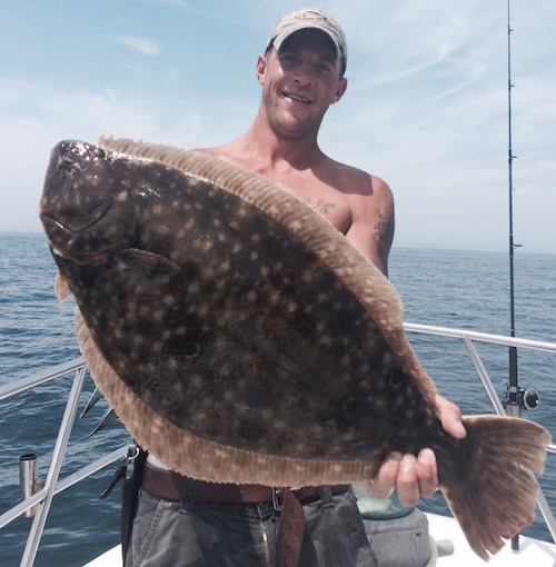 Keith Sweat of  Keith Sweat of the Prime Time III with a nice fluke. Photo: Mike Boccio