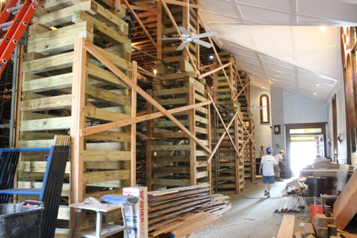 The construction crew scrambled to install four 25-foot-tall wooden support towers before the ceiling came to rest right on top of them. Photo: Katie Blasl