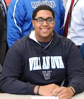 Ethan Greenidge at Riverhead High School on the day he signed to play at Villanova on a football scholarship