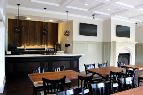 The restaurant's catering room offers its own bar and two televisions with HDMI input and surround sound. Photo: Katie Blasl