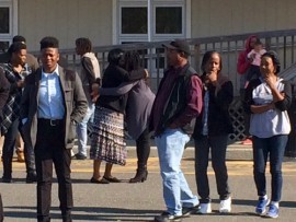 Family and friends of Demitri Hampton gathered outside Riverhead Justice Court last week for the initial arraignment. File photo: Denise Civiletti