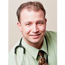 Troyan, 37, is pictured above in his headshot on the East End Urgent and Primary Care website.