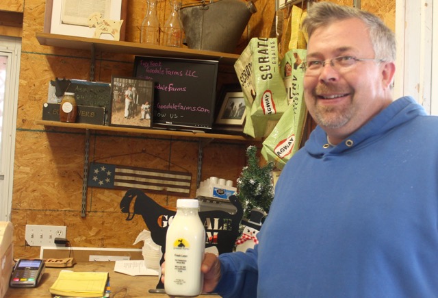  Hal Goodale holds a bottle of cow’s milk produced at his farm in Aquebogue. The milk is pasteurized, but not homogenized and sold at the Goodale Farms store on Main Road, as well as delivered to Goodale’s home delivery customers. Photo:Denise Civiletti